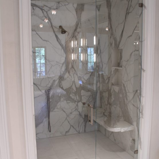 Calacutta Gold Shower Slab wall with niche and bench