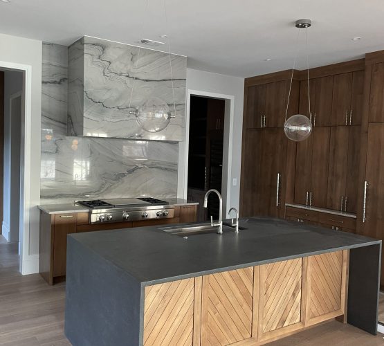Quartzite Wrapped Hood with Black waterfall island