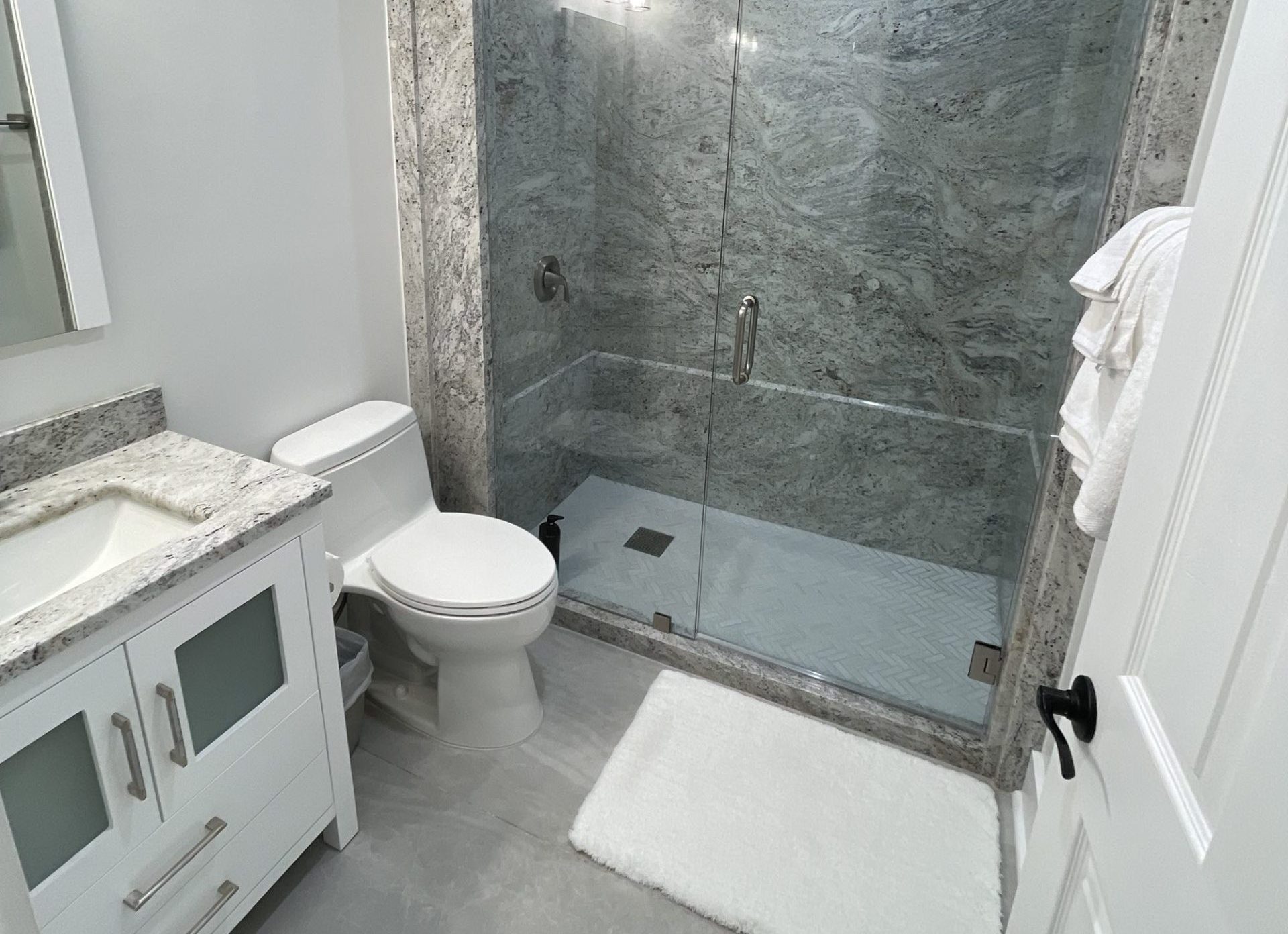 Salinas White Slab Shower walls